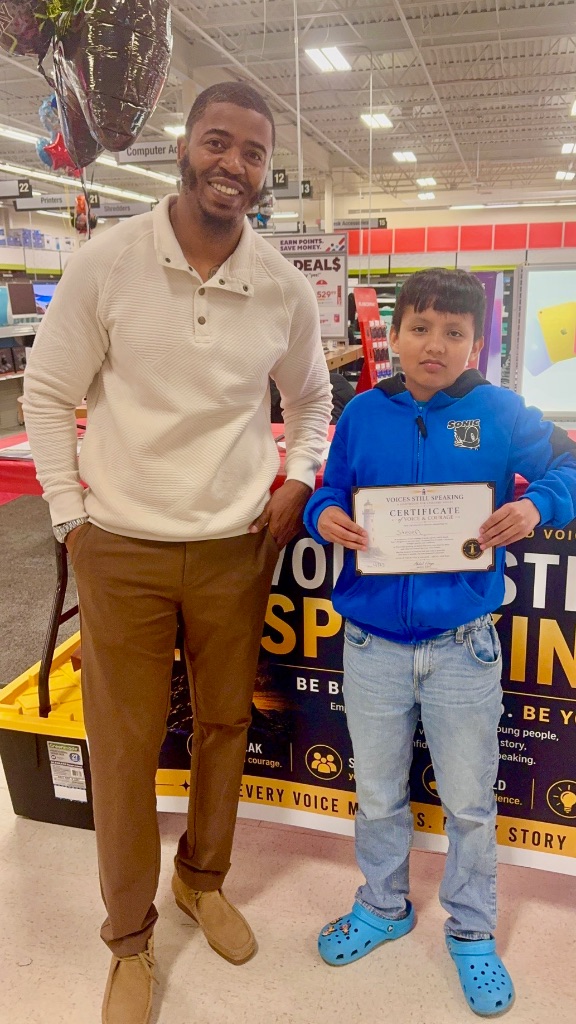 Student receiving certificate